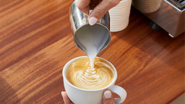 pouring a latte