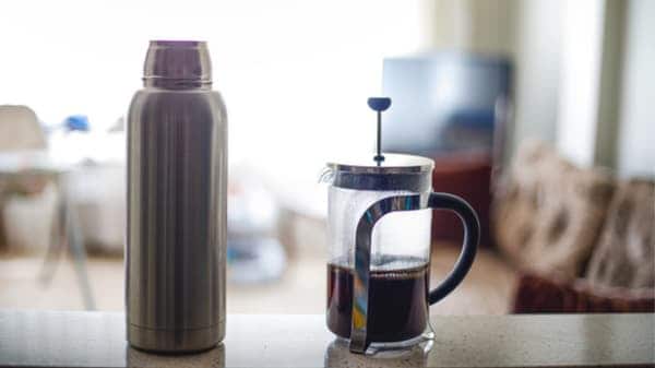 french press and insulated mug