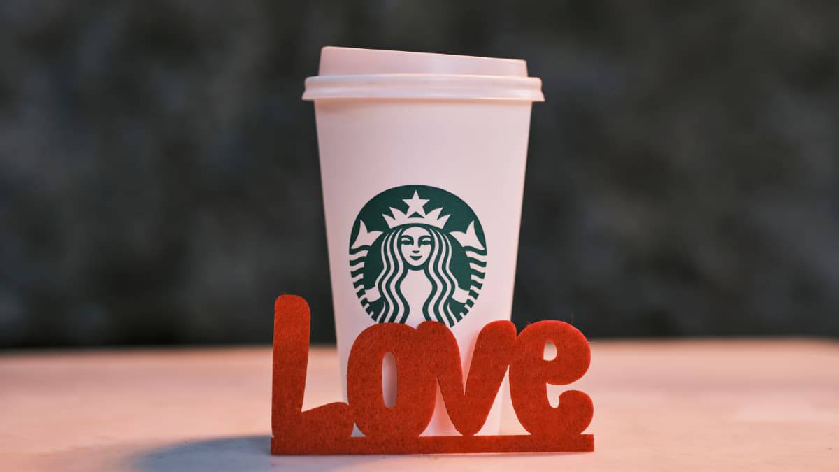 Starbucks cup and love sign